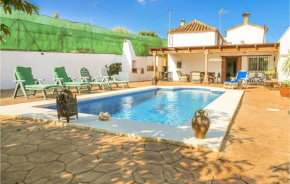 Nice home in Coin with Outdoor swimming pool, WiFi and 3 Bedrooms